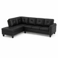 Corner sofa in black faux leather with studs